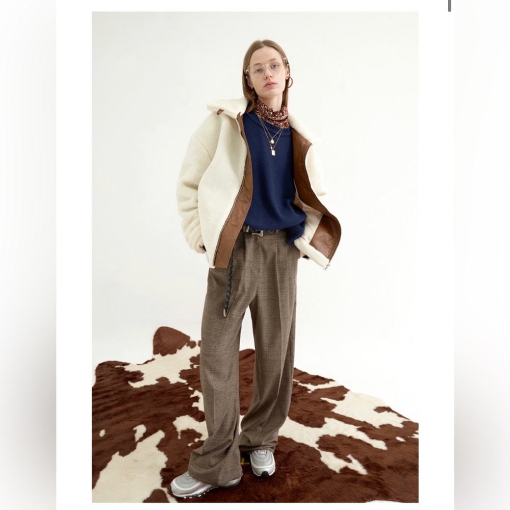 Two pairs of tailored trousers.